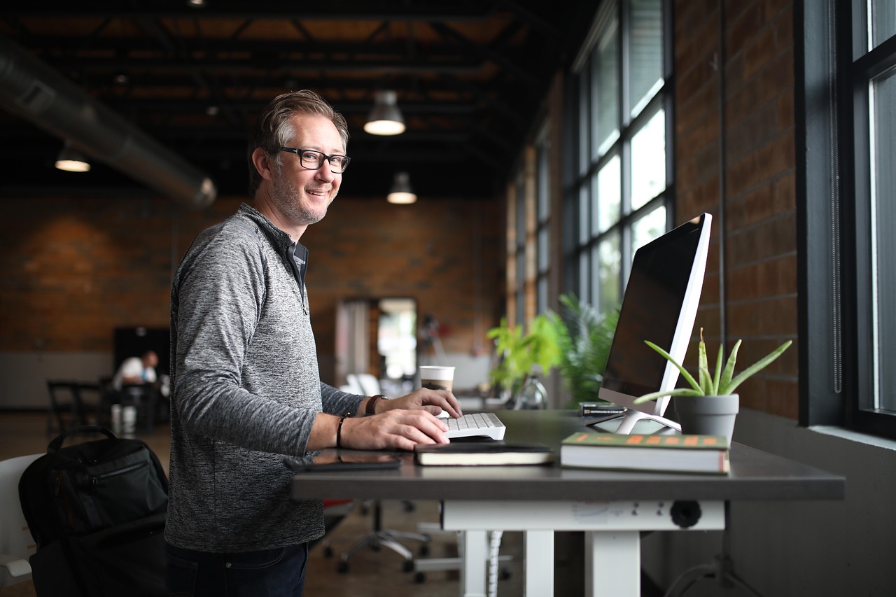 Office desk, man, business — 5 Ways Your Company Can Benefit from Tracking Software