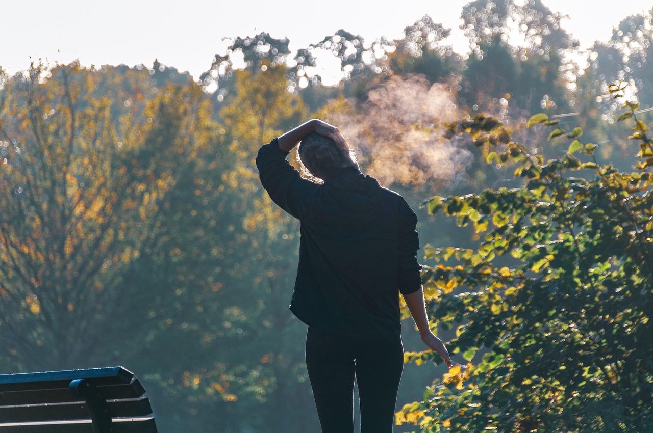 Woman, exercise, stretching — Tips for Finding the Best Plan When Traveling Internationally