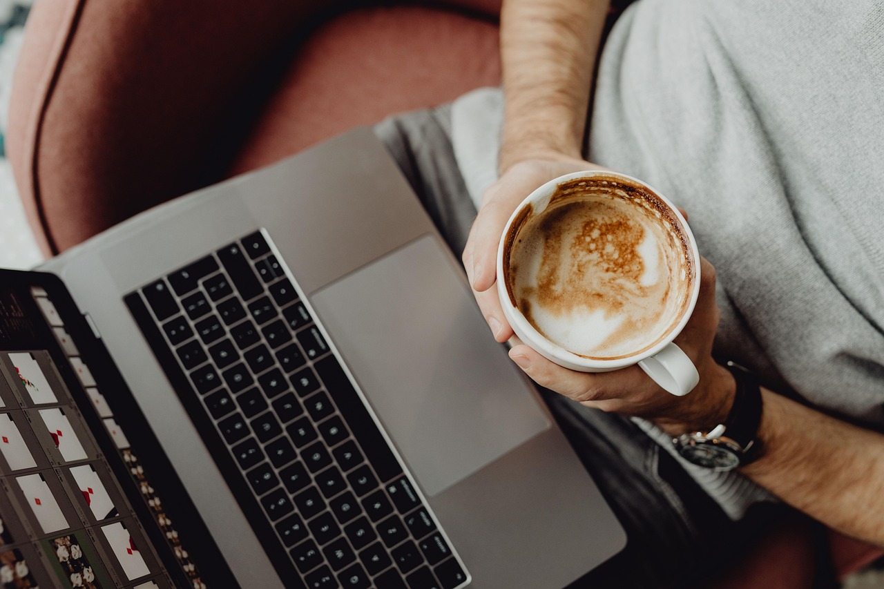 Coffee, cup, computer — Unlocking Growth for Small Businesses through Tailored SEO Services