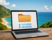 Laptop displaying a folder icon against a scenic coastal background